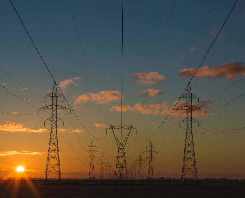 Power pylons at sunset