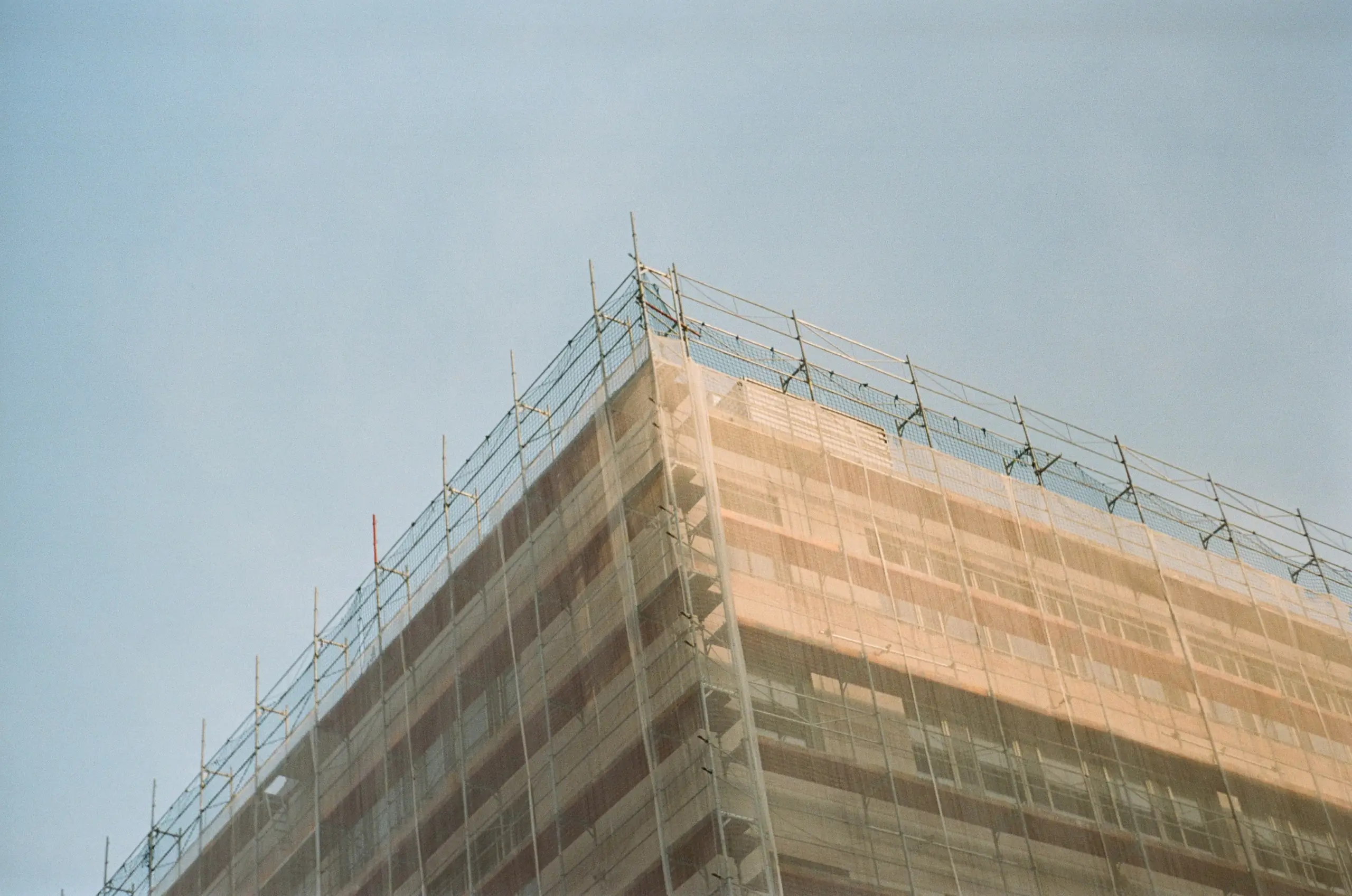 construction seen from the ground with scaffolding